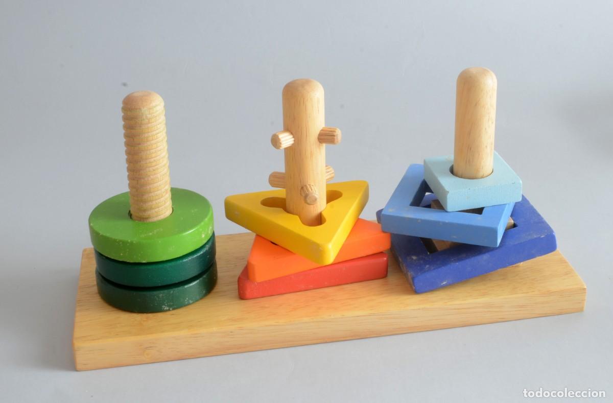 Giochi educativi: Juguete de madera, rompecabezas &rdquo;Encaja y Gira&rdquo; de Bigjigs Toys, desarrollo motricidad