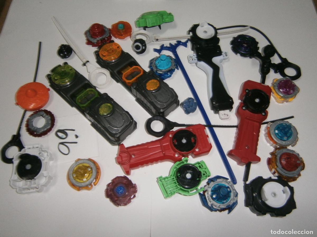 Juegos de mesa: LOTE COMPLEMENTOS Y TROMPOS BEYBLADE - Foto 1