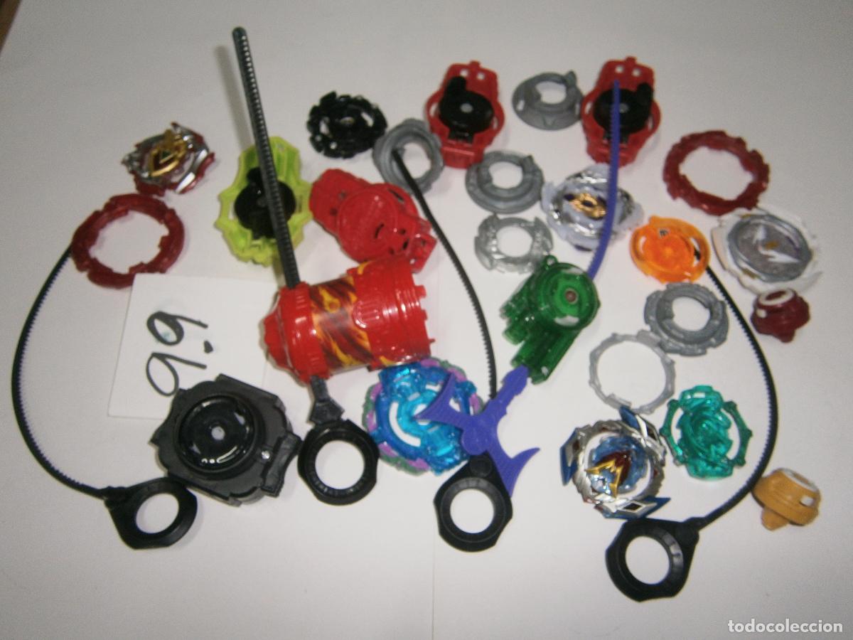 Juegos de mesa: LOTE COMPLEMENTOS Y TROMPOS BEYBLADE - Foto 1