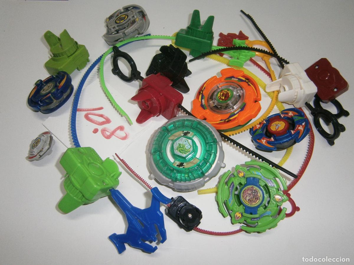 Juegos de mesa: GRAN LOTE BEYBLADE (PEONZAS Y LANZADERAS) - Foto 1
