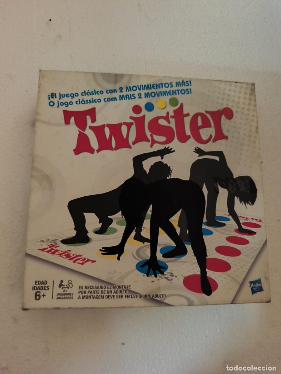 Juegos de mesa: Twister: &iexcl;El juego cl&aacute;sico con 2 movimientos m&aacute;s. 2012