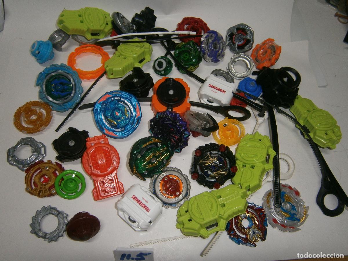 Juegos de mesa: GRAN LOTE PEONZAS Y ACCESORIOS BEYBLADE