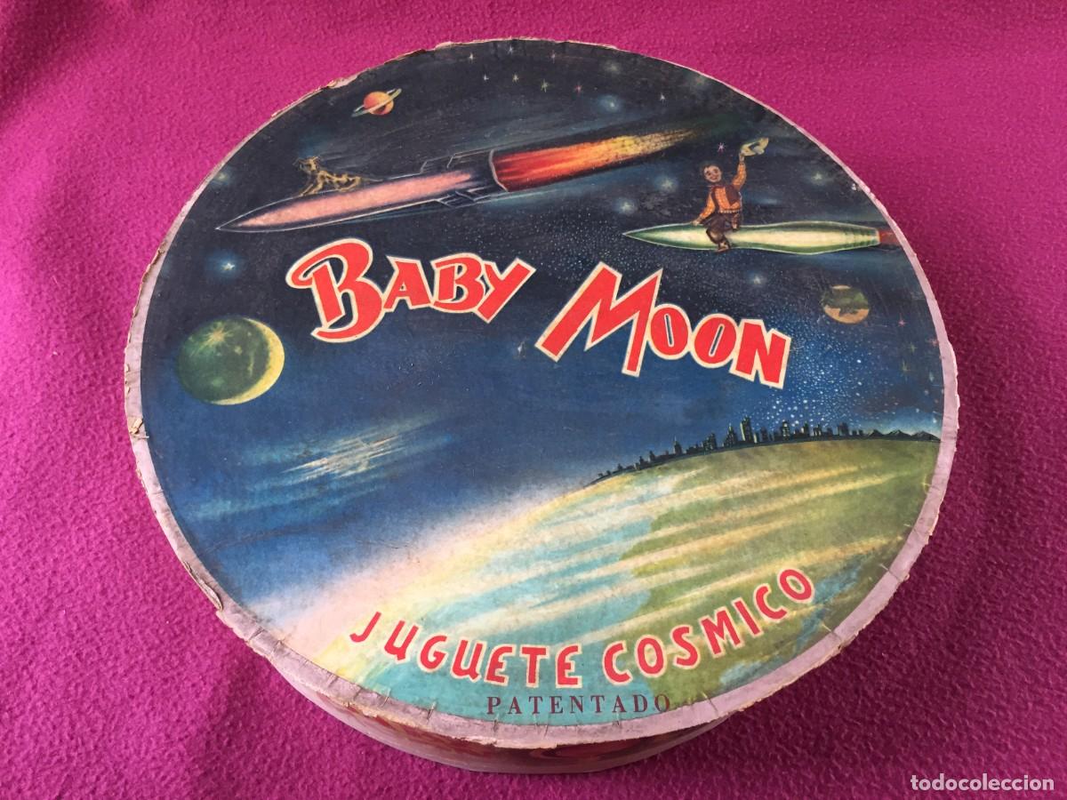 Juegos de mesa: Juguete Espacial cosmico infantil &ldquo;Baby moon&rdquo; fabricado en industria indeterminada de D&eacute;nia en 1952