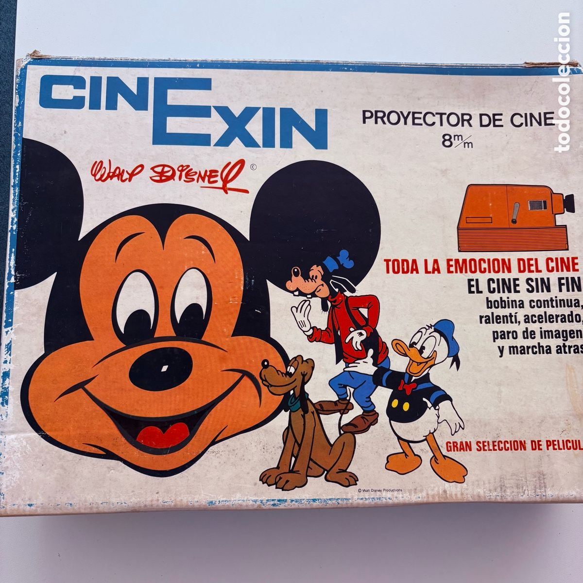 Juguetes antiguos Exin: Proyector de cine 8mm cinexin naranja Exin ref. 0800 a&ntilde;os 70 con pelicula