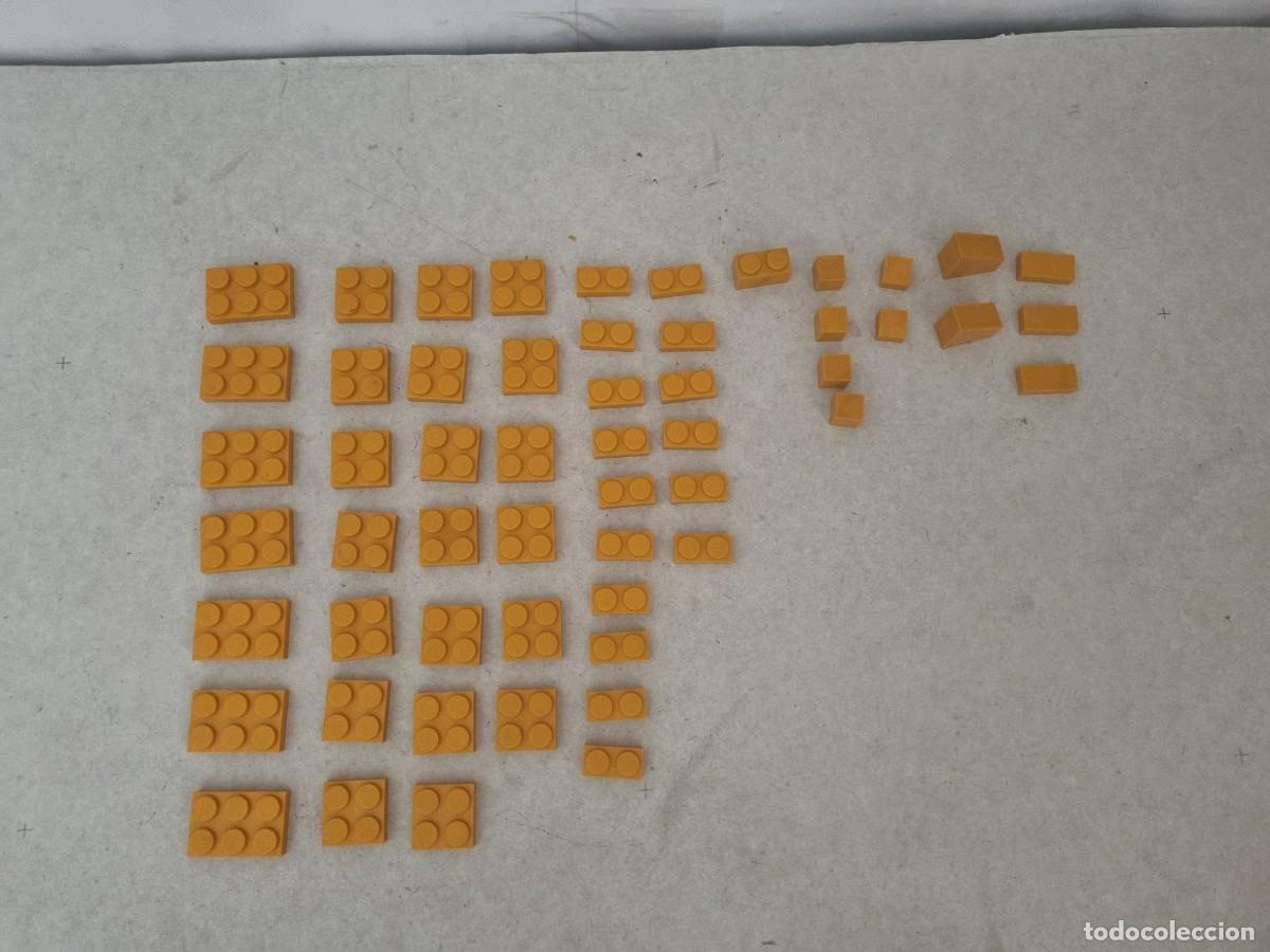 Juguetes antiguos Exin: Lote de 55 piezas naranjas variadas Exin West