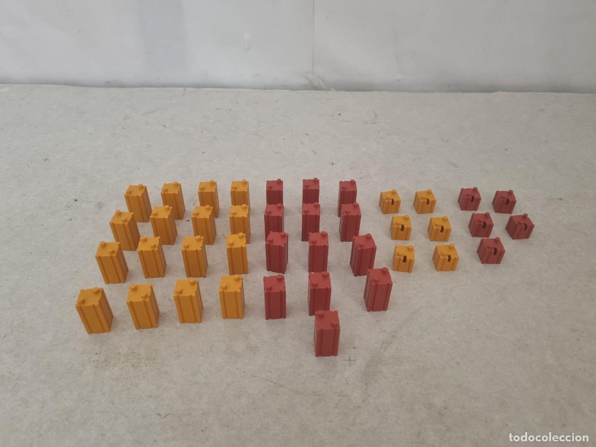 Juguetes antiguos Exin: Lote de 40 piezas laterales rojas y naranjas Exin West