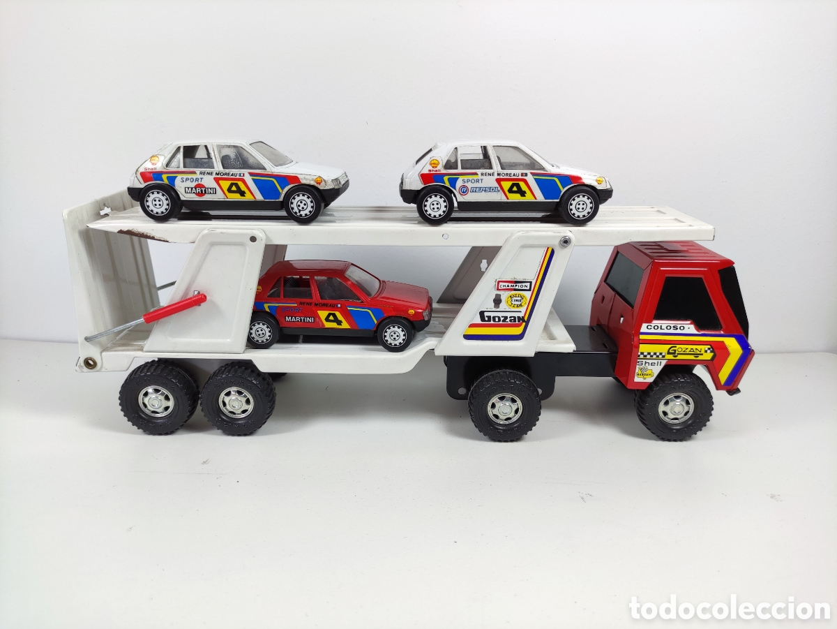 Juguetes antiguos Goz&aacute;n: Cami&oacute;n portacoches Gozan Coloso con 3 Peugeot 205