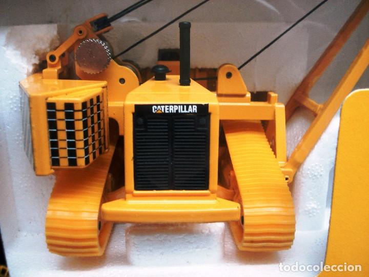 Poseur de tubes caterpillar C-591 - Joal Compact échelle 1/70