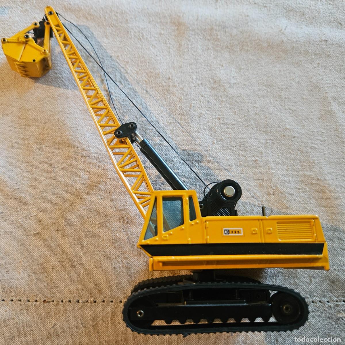 Juguetes antiguos Joal: Caterpillar grua excavadora 225 - marca Joal ref. n&deg; 216 - met&aacute;lico finales de los 80