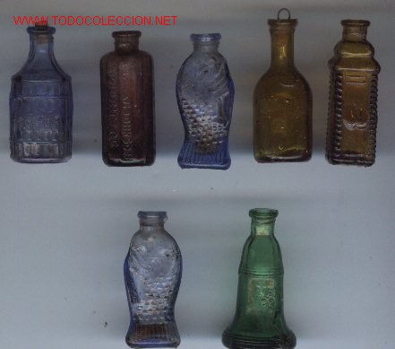 Juguetes antiguos y Juegos de colecci&oacute;n: 7 botellas en miniatura de cristal. A&ntilde;os 60.