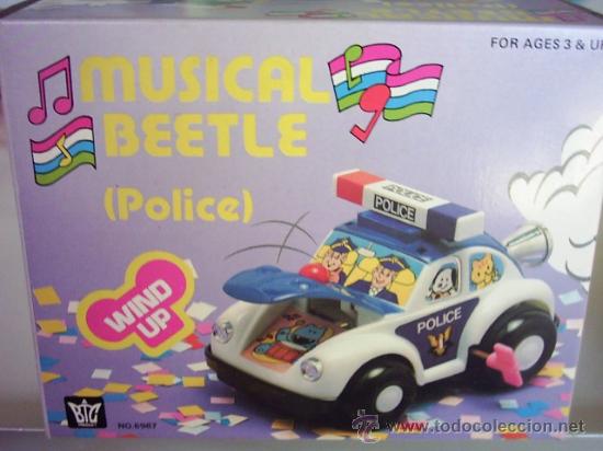 Brinquedos antigos e Jogos de cole&ccedil;&atilde;o: COCHE ESCARABAJO POLICIA A RESORTE O CUERDA A&Ntilde;OS 80 A ESTRENAR*