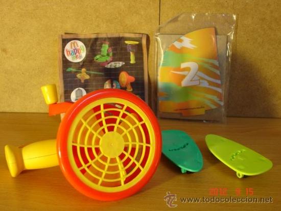 Juguetes antiguos y Juegos de colecci&oacute;n: 2 skates con velas y ventilador manual para hacer carreras - Obsequio de McDonalds