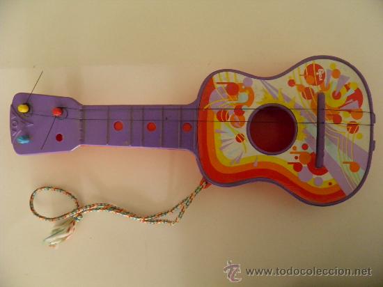 Juguetes antiguos y Juegos de colecci&oacute;n: Guitarra de juguete Reig. Largo 35 cm.