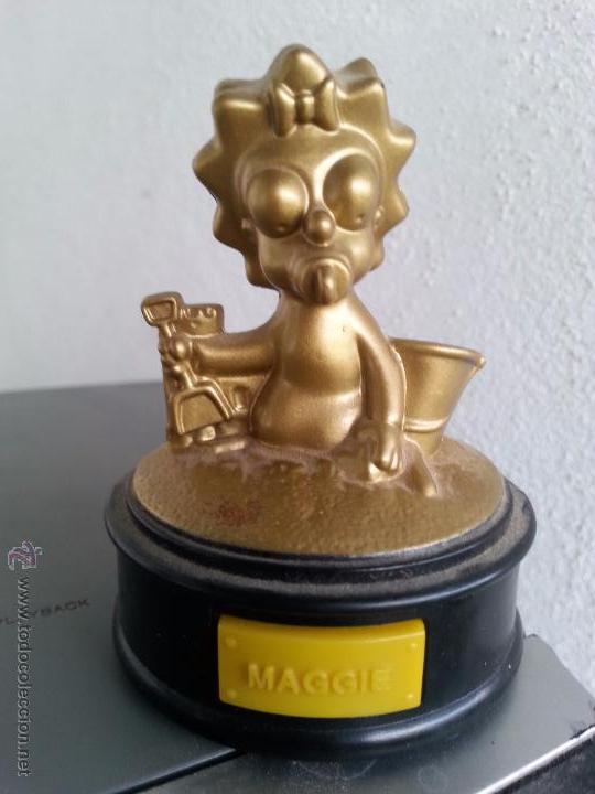 Juguetes antiguos y Juegos de colecci&oacute;n: MU&Ntilde;ECO DE BURGER KING DORADO DE LOS SIMPSONS CON SONIDO ( MAGGIE ) USADO