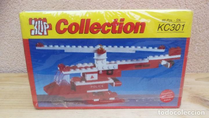 Juguetes antiguos y juegos de colecci&oacute;n: HELIC&Oacute;PTERO DE POLIC&Iacute;A JUEGO BLOQUES MARCA KLIP NUEVO
