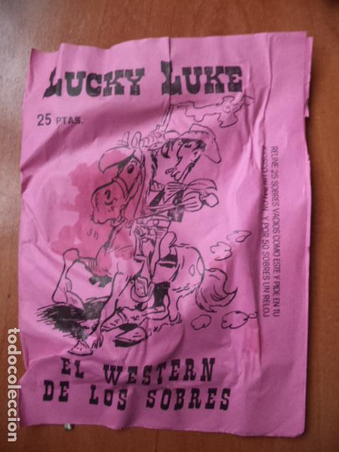 Giocattoli antichi e Giochi di collezione: SOBRE SORPRESA. LUCKY LUKE. 25 PESETAS. MEDIDAS : 21 X 15 CM.