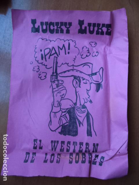 Giocattoli antichi e Giochi di collezione: SOBRE SORPRESA. LUCKY LUKE. 25 PESETAS. MEDIDAS : 21 X 15 CM.