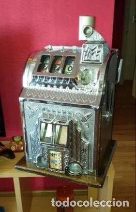 Juguetes antiguos y juegos de colecci&oacute;n: Tragamonedas antiguo