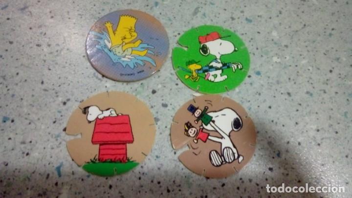 Juguetes antiguos y Juegos de colecci&oacute;n: LOTE 3 TAZOS SNOOPY + 1 TAZO SIMPSONS
