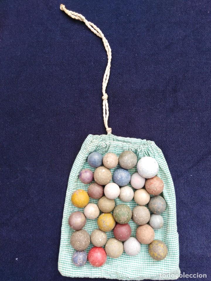 Juguetes antiguos y Juegos de colecci&oacute;n: Bolsa antigua canicas
