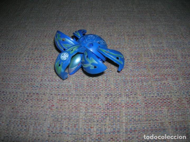 Juguetes antiguos y Juegos de colecci&oacute;n: Bakugan. Figura transformer articulada 460G. Mide 3 cm. cerrada.