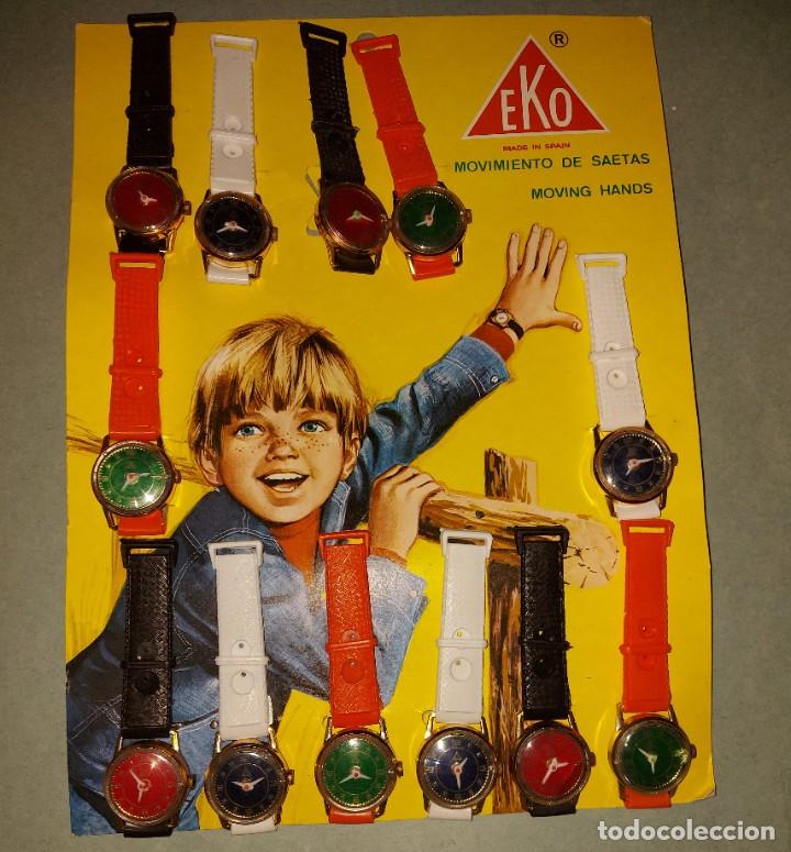 Juguetes antiguos y juegos de colecci&oacute;n: RELOJES EKO - EXPOSITOR CON 12 RELOJES