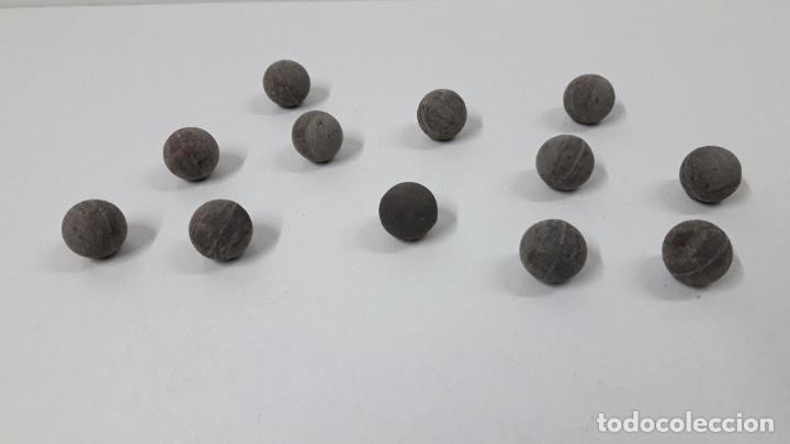 Juguetes antiguos y Juegos de colecci&oacute;n: LOTE DE DOCE CANICAS ANTIGUAS . REALIZADAS EN CAUCHO COMPRIMIDO