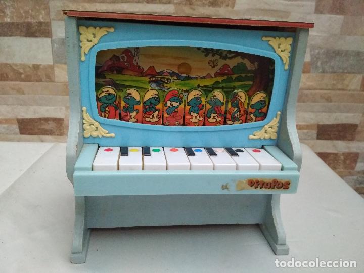Juguetes antiguos y Juegos de colecci&oacute;n: LOS PITUFOS,PIANO DE MADERA.muy bonito funciona, mirar fotos y medidas