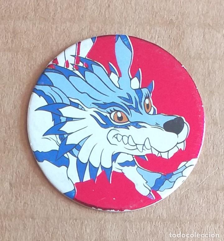 Juguetes antiguos y juegos de colecci&oacute;n: Tazo N&ordm; 36 DIGIMON Garurumon Fondo rojo de MAGIC BOX INT.