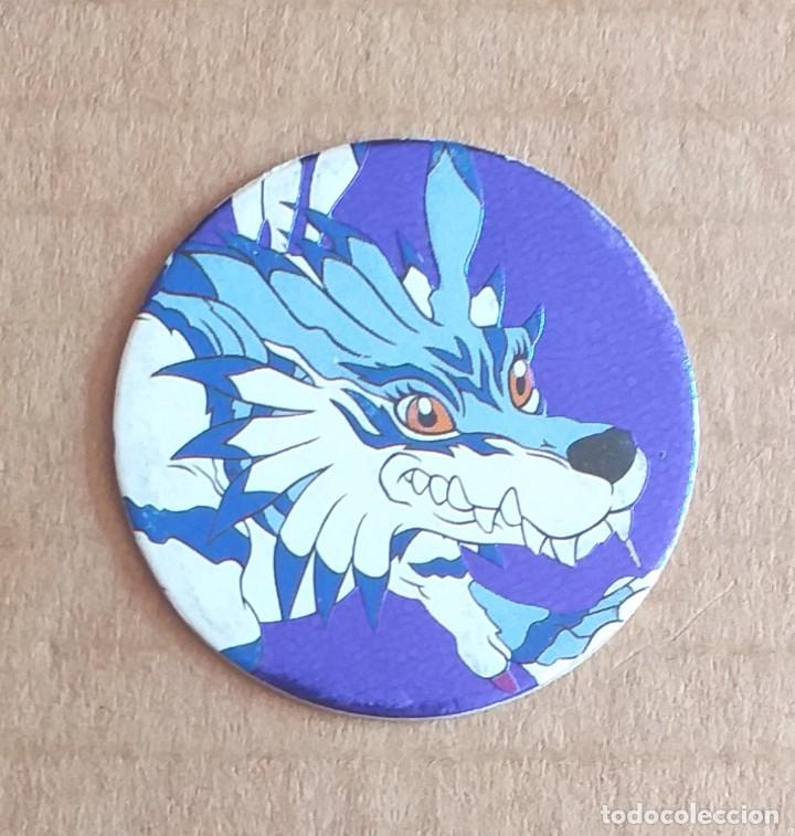 Juguetes antiguos y juegos de colecci&oacute;n: Tazo N&ordm; 36 DIGIMON Garurumon Fondo azul de MAGIC BOX INT.