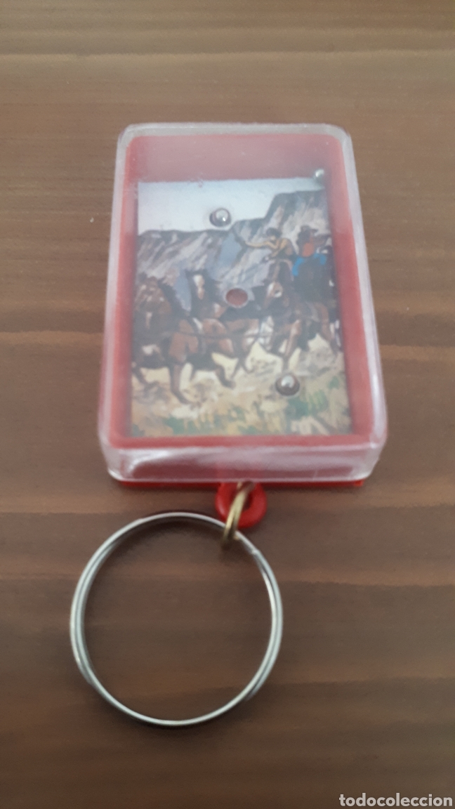 Giocattoli antichi e Giochi di collezione: Peque&ntilde;o juego de habilidad en forma de llavero con imagen del oeste juguete de kiosko a&ntilde;os 70