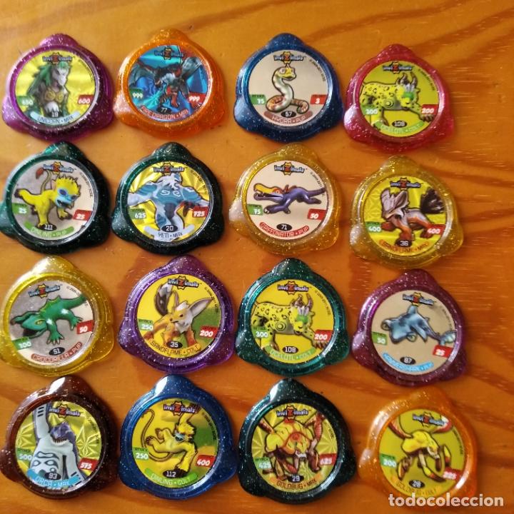 Juguetes antiguos y Juegos de colecci&oacute;n: INVIZIMALS - LOTE DE 16 KRAKS, TAZOS PANINI.