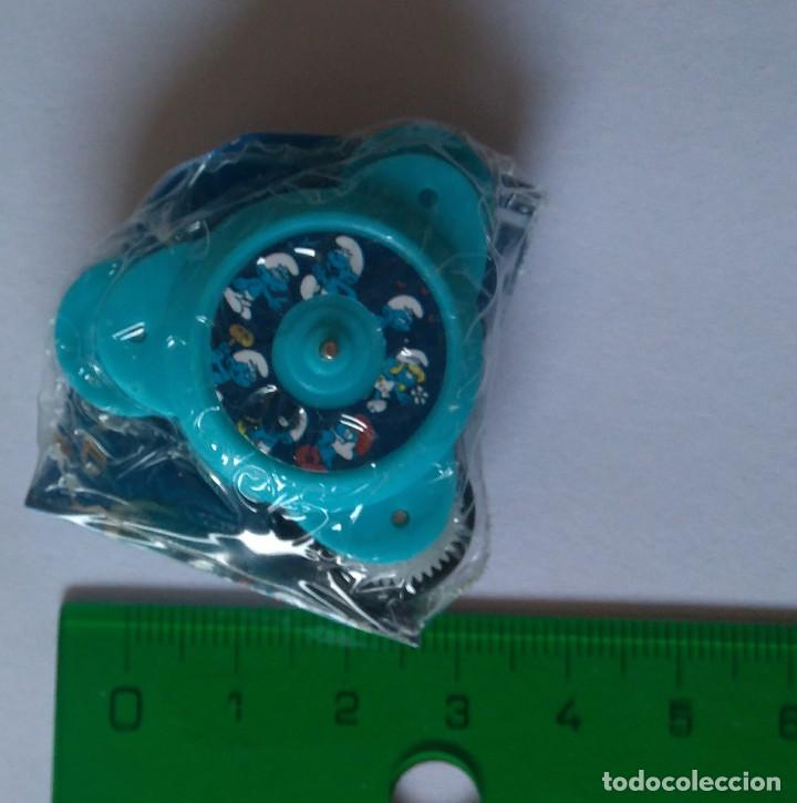 Juguetes antiguos y Juegos de colecci&oacute;n: fidget spinner mercadona hacendado huevo sorpresa chocolate pitufos smurfs gadget bpz papel