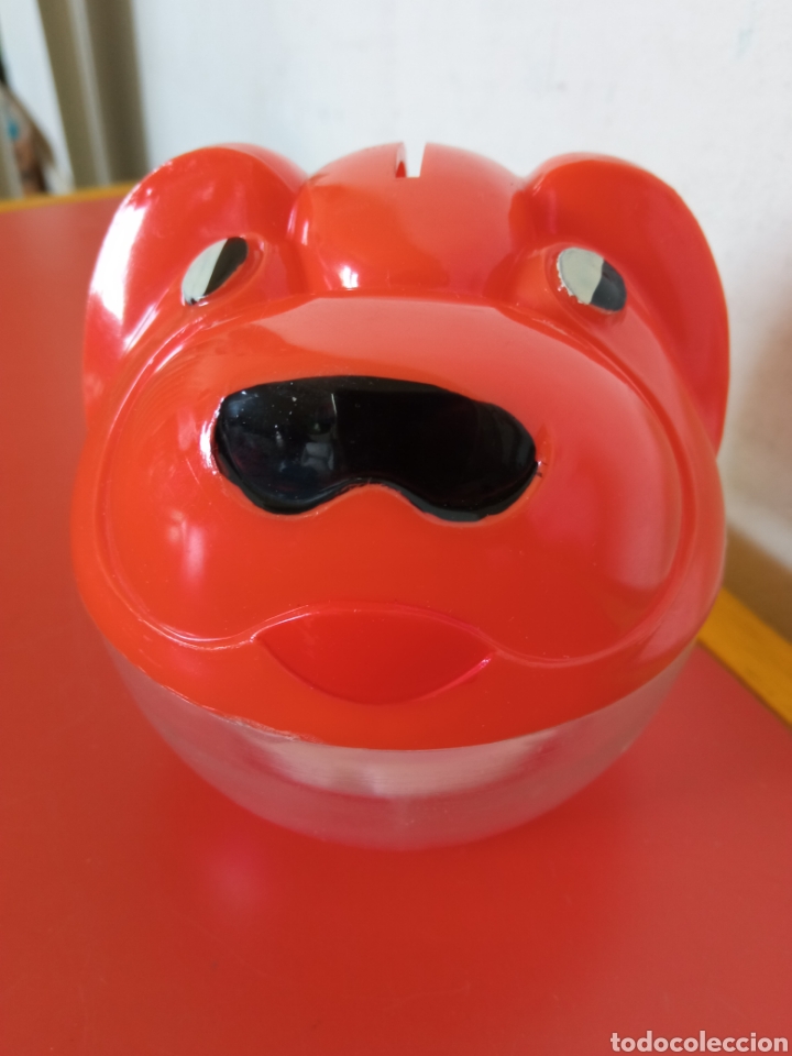 Juguetes antiguos y Juegos de colecci&oacute;n: HUCHA PERRO NARANJA CON CLAVE (8 CM).VILPA BOTOPLASTIC 70S.NUEVA.