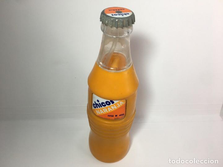 Juguetes antiguos y Juegos de colecci&oacute;n: BOTELLA CHICOS NARANJA JUEGO DE AGUA