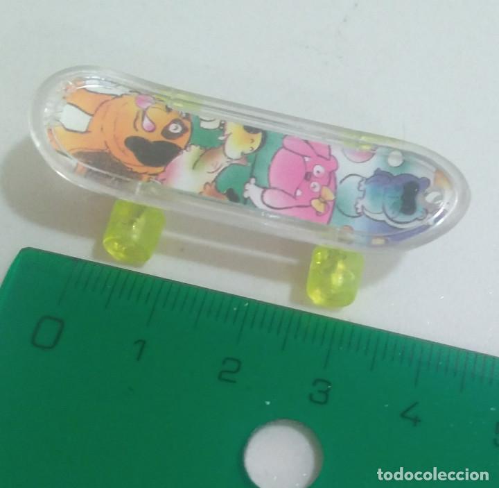 Juguetes antiguos y Juegos de colecci&oacute;n: patin miniatura patinete skate animales perros mini