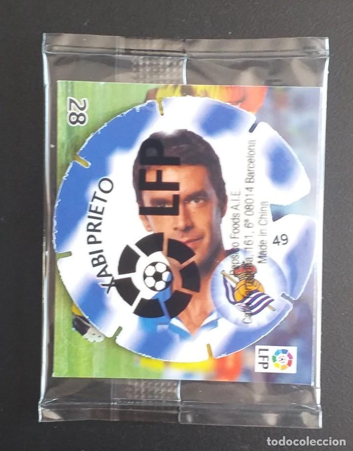 Juguetes antiguos y juegos de colecci&oacute;n: TAZO VOLADOR n&ordm; 49 XABI PRIETO REAL SOCIEDAD CHEETOS MATULIGA 2012-2013. Precintado.