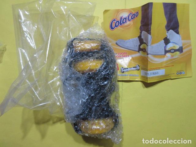 Juguetes antiguos y Juegos de colecci&oacute;n: COLA CAO NUTREXPA - PARA PONER EN CALZADO Y USAR COMO PATIN