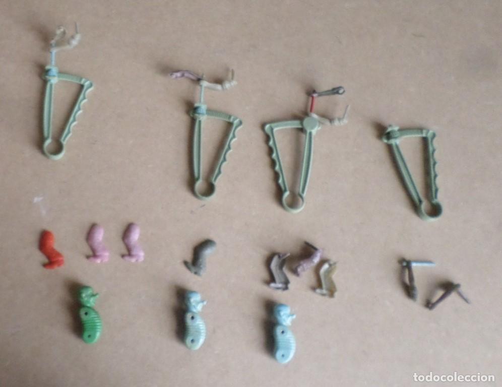 Juguetes antiguos y Juegos de colecci&oacute;n: Mu&ntilde;eco que se monta se da vueltas y sale disparadas &ndash; desarma las piezas