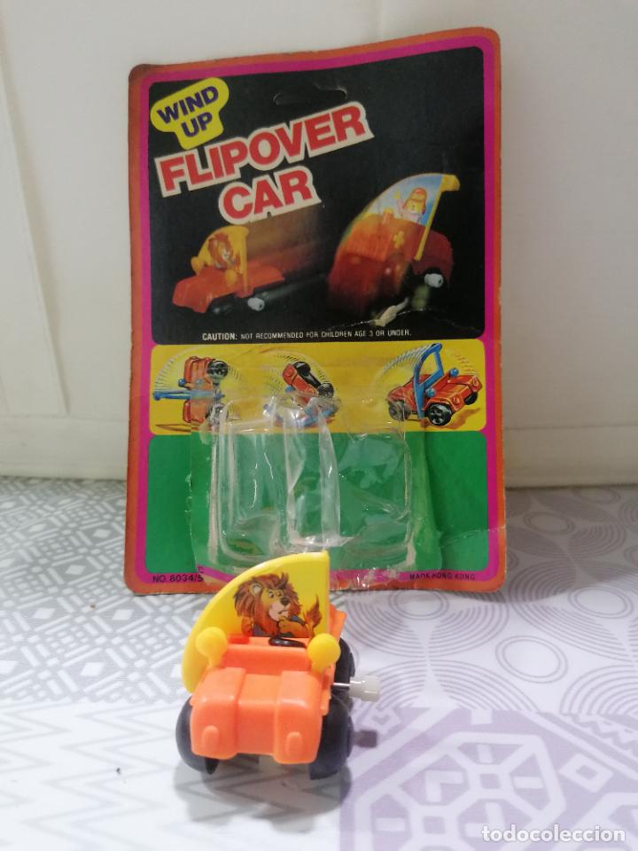 Giocattoli antichi e Giochi di collezione: FLIPOVER CAR - WIND UP, BLISTER ORIGINAL, MADE IN HONG KONG