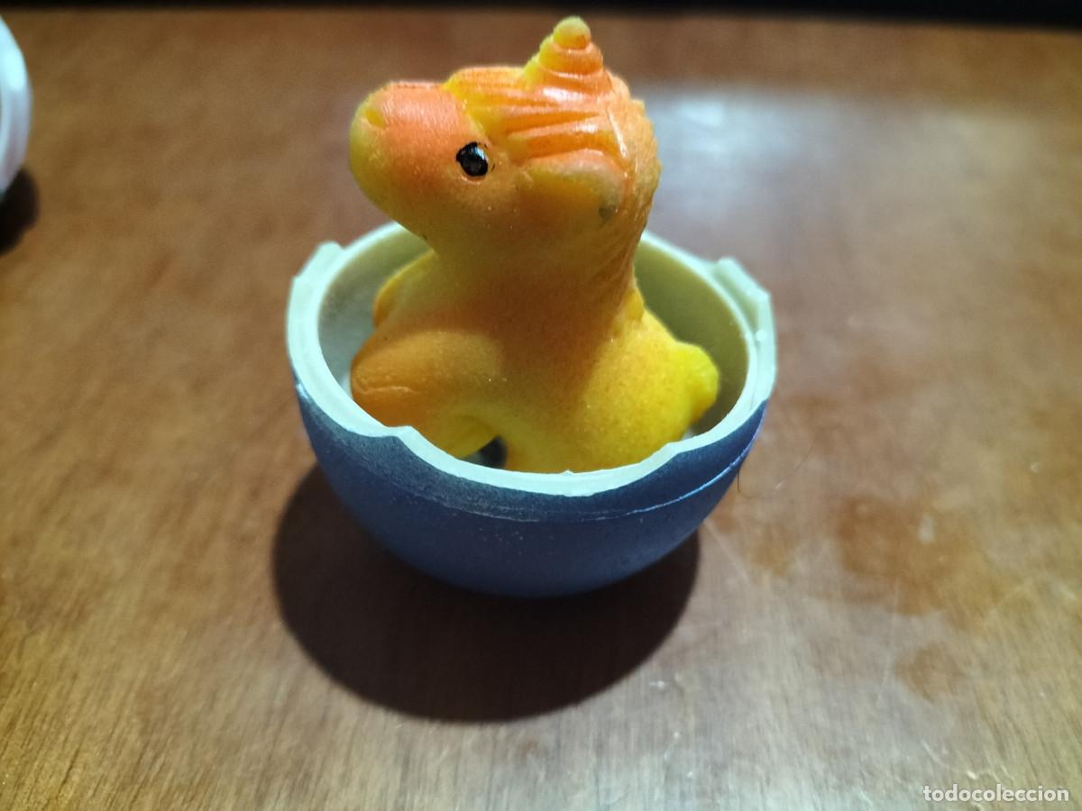 Brinquedos antigos e Jogos de cole&ccedil;&atilde;o: MEDIO HUEVO. CON UNICORNIO NARANJA. BUEN ESTADO EN ESTE FORMATO. B-4