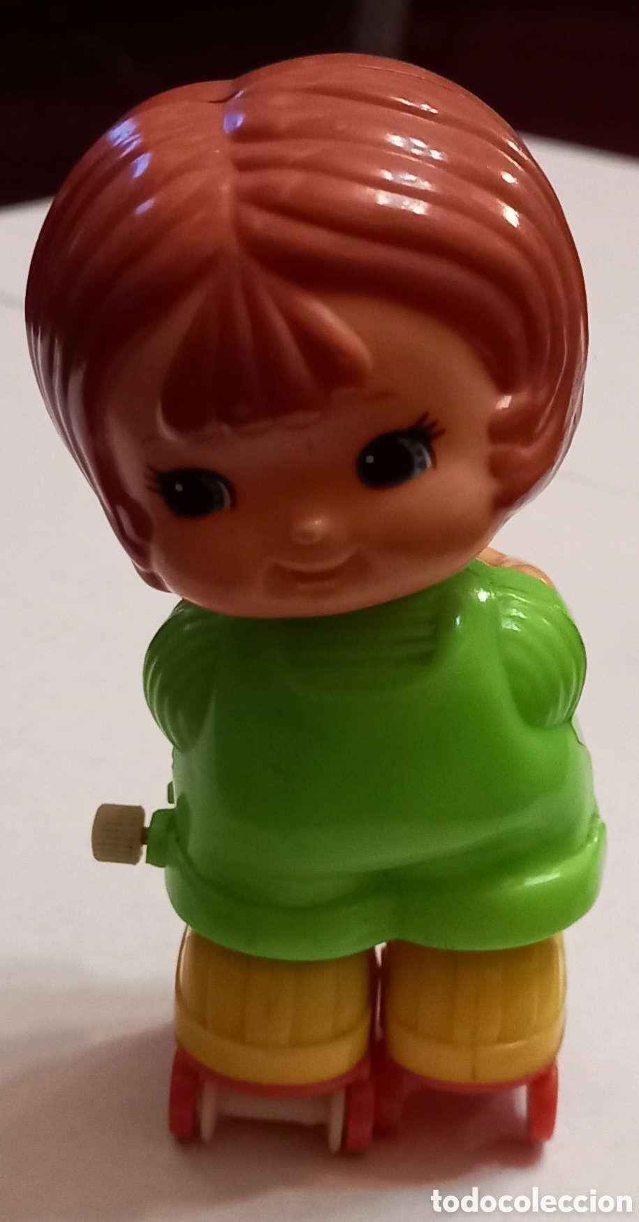 Giocattoli antichi e Giochi di collezione: Mu&ntilde;equita a cuerda retro patinando Tomy 1979 envio de M&aacute;laga