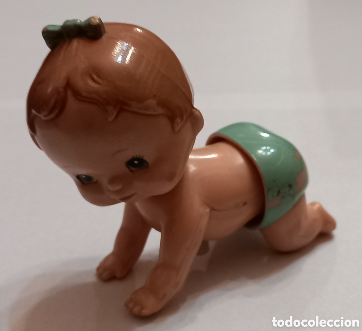 Juguetes antiguos y Juegos de colecci&oacute;n: Mu&ntilde;equita bebe a cuerda retro Tomy 1977
