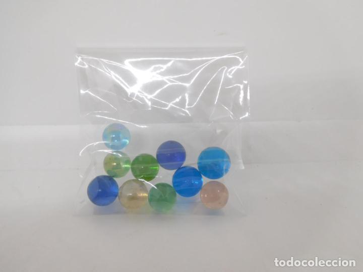 Juguetes antiguos y Juegos de colecci&oacute;n: Bolsita de canicas, bolas de los a&ntilde;os 80. Ref 3