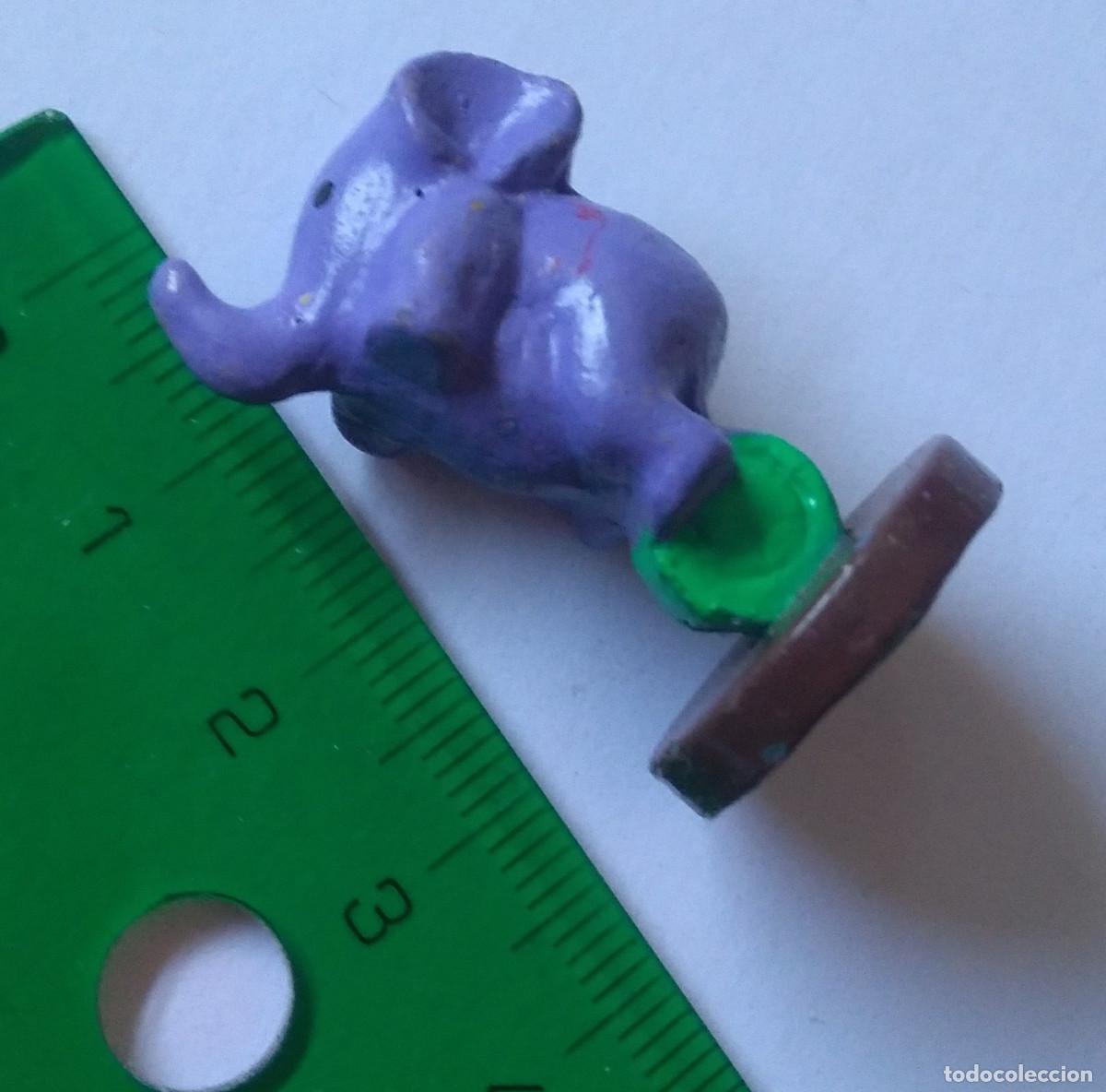 Juguetes antiguos y juegos de colecci&oacute;n: figura elefante peana no es pvc ni plastico miniatura mini mu&ntilde;eco figurita mu&ntilde;equito monociclo ?