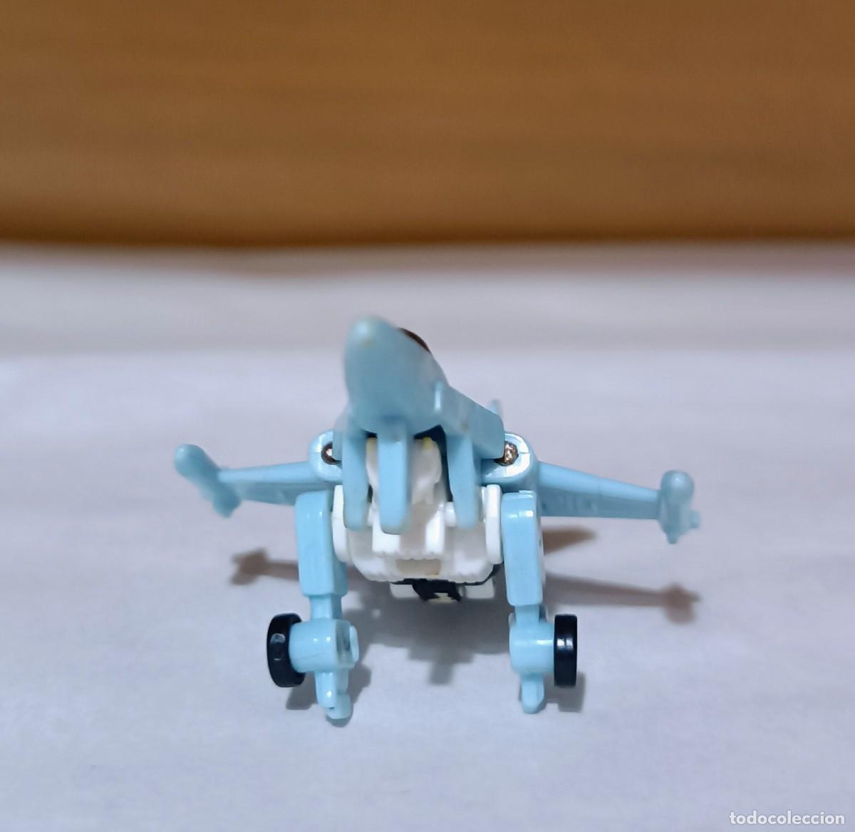 Juguetes antiguos y juegos de colecci&oacute;n: Mini transforme vintage - Foto 4