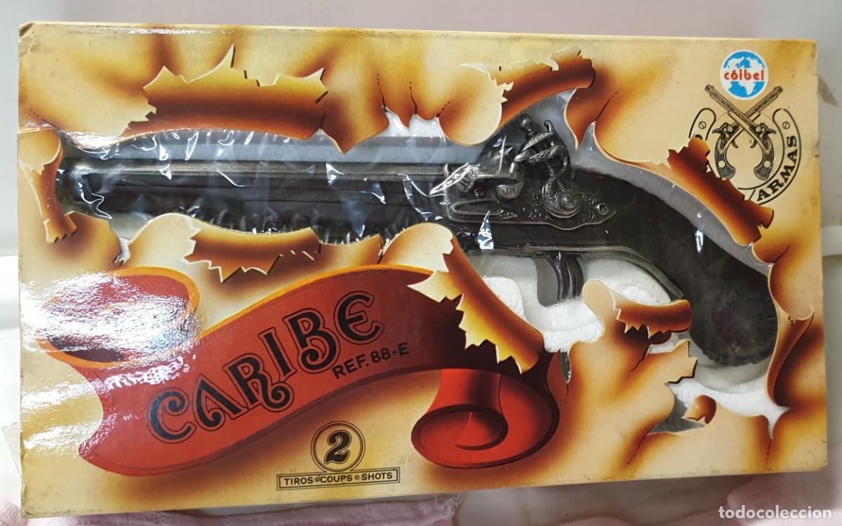Altes Spielzeug und Spiele: PISTOLA JUGUETE MODELO CARIBE REF. 88-E EN CAJA C&Oacute;IBEL 27X14 CM.
