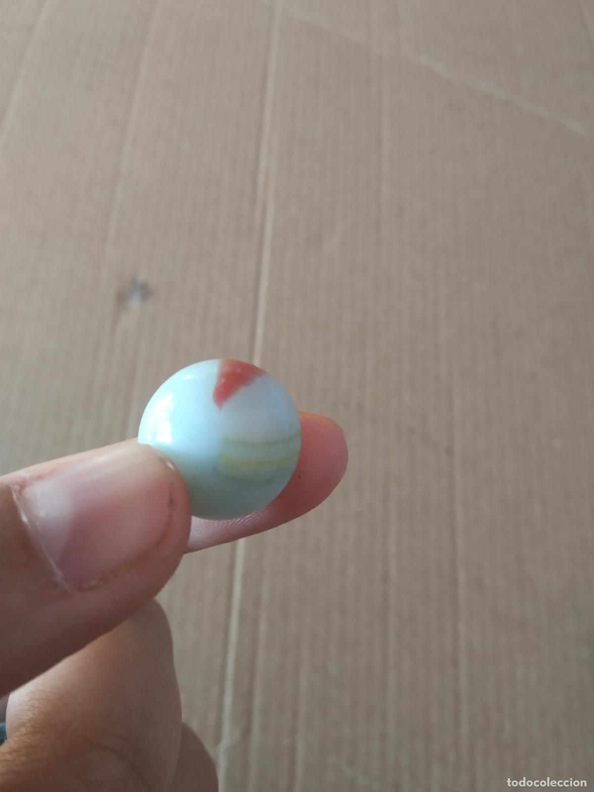 Juguetes antiguos y Juegos de colecci&oacute;n: CANICA BOLA DE JUGUETE COLOR ROJO AMARILLO AZUL