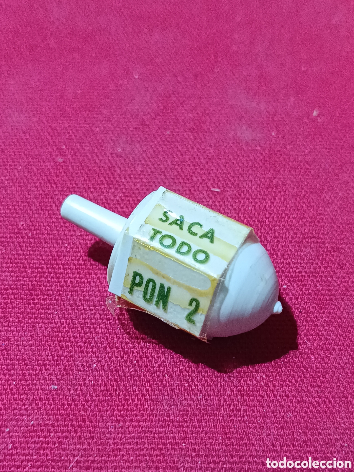 Juguetes antiguos y Juegos de colecci&oacute;n: Antigua pirindola para juegos de cromos tabas canicas o similar de kiosko a&ntilde;os 70/80