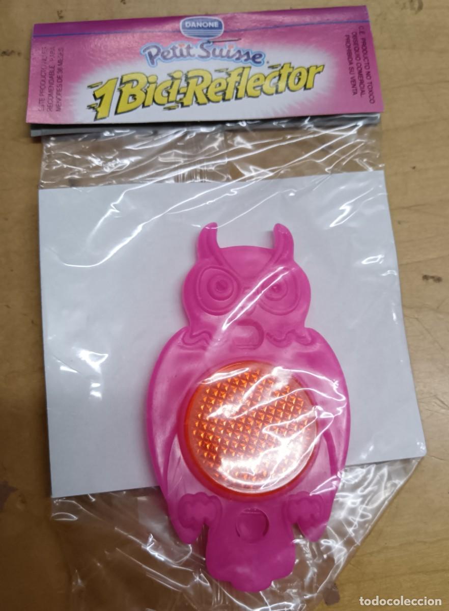 Juguetes antiguos y Juegos de colecci&oacute;n: BICI-REFLECTOR B&Uacute;HO ROSA PETIT SUISSE DANONE SIN ABRIR